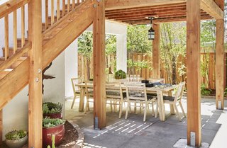 The lower level area is now the perfect protected spot for al fresco dinner parties.