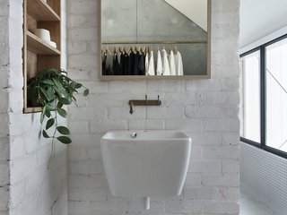 A detail of the ensuite bathroom. "House A embodies our desire to build something relevant for our generation," say the architects. "A lot of younger people and downsizers don't have a lot of stuff or are having children much later, and we are using our homes for all kinds of things, from starting businesses or hosting a long table dinner for 20. We wanted to build a prototype house that did all of these things, while being affordable, sustainable and made from really beautiful, long lasting materials."