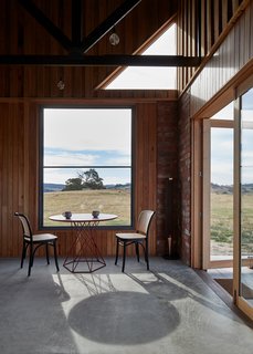 "Our design fulfilled the fundamental concern to create a connection to place, capture site and distant views, while providing humble protection from the elements," the architects note.