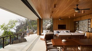The cedar-clad interior provides protection from the sun and orients views towards the ocean.