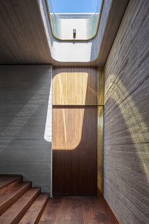 A rounded skylight over the stairs.