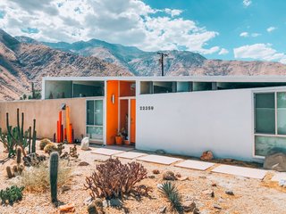 Dubbed the "Dazey Desert House," the two-bedroom, three-bath home offers the best of both worlds: it's nestled in a desert setting, yet only a five-minute drive from "bustling Palm Springs entertainment."