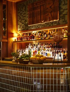 A 1920s Office Building Is Revamped as a Craftsman-Inspired Hotel in Los Angeles - Photo 2 of 10 - Rudolph’s Bar & Tea, named after the previous owner of the Commercial Exchange Building, is one of the amenities in the hotel, providing tea-infused cocktails, full tea service, and small plates to visitors and locals.