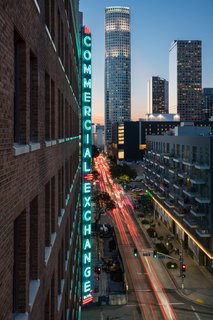 A 1920s Office Building Is Revamped as a Craftsman-Inspired Hotel in Los Angeles - Photo 3 of 10 - The 12-story Commercial Exchange sign, the largest in Los Angeles, still hangs proudly at the hotel's entrance.