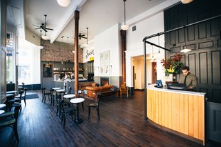 The lobby of the hotel contains a cafe and lounge space that's complete with a fireplace. The cozy atmosphere provides an ideal location from which to look out onto the city and enjoy a beverage with fellow travelers.