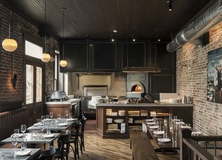 History and Modernity Meet in This Industrial Hotel and Restaurant in Philadelphia - Photo 9 of 11 - An open kitchen concept connects the wood-fired oven with the communal dining room. 