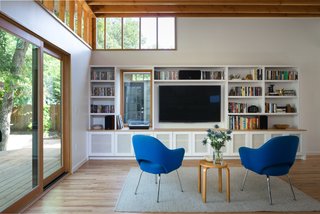 Bringing Light Into a Modest 1940s Bungalow in Austin - Photo 7 of 10 - Continuous built-ins provide plentiful storage. 