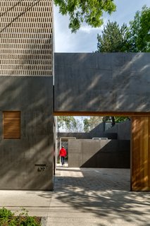 Delightful Material Contrasts Define a Courtyard Home in Mexico City - Photo 2 of 10 -