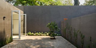 Delightful Material Contrasts Define a Courtyard Home in Mexico City - Photo 8 of 10 -
