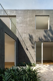Delightful Material Contrasts Define a Courtyard Home in Mexico City - Photo 9 of 10 -