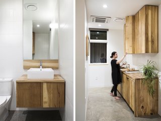 White oak cabinetry was custom built and fabricated by FWD. Polished concrete floors and white tile complement the warm wood tones. 
