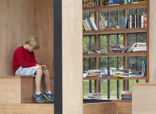 Toronto's Story Pod Doubles as a Lending Library and Community Hub - Photo 4 of 7 - Guests are invited to bring and take books, or lounge on the built-in seating while reading.