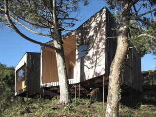 A Timber-Clad Sauna in Chile Angles For Lakeside Views - Photo 1 of 9 -