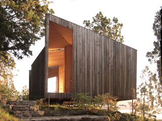 Simple solid and void carvings create a purposefully oriented and constructed complex of volumes that pull the user out to nature and into repose. 