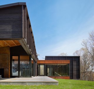 A Dramatic Cantilevered Roof Creates a Spacious Terrace Overlooking Lake Michigan - Photo 1 of 11 - The interior living spaces are directly accessible to the exterior terrace. 