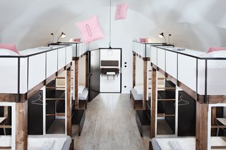 A Stylish Hostel in a Historic Czech Fortress Starts at $16 a Night - Photo 5 of 19 - The biggest dorm room sleeps 10, with four up top and six below. The mezzanine sleeping area maintains the cool factor with perforated guards. 