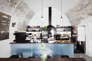 A Stylish Hostel in a Historic Czech Fortress Starts at $16 a Night - Photo 14 of 19 - The Cooking Bar Cafe provides beverages, freshly made breads, and other deluxe snacks.