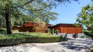 An Award-Winning Midcentury Residence in Los Angeles County Asks $3.9M - Photo 1 of 17 - The cedar clad exterior sits atop a concrete foundation.