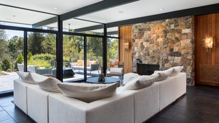 An Award-Winning Midcentury Residence in Los Angeles County Asks $3.9M - Photo 2 of 17 - Interior and exterior living spaces blend seamlessly together. 
