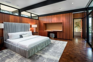 An Award-Winning Midcentury Residence in Los Angeles County Asks $3.9M - Photo 9 of 17 - Modular millwork folds to reveal a desk, or conceal it when not in use. 