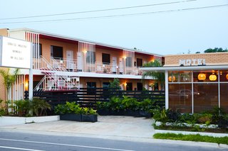 The reworked, modernist building maintains reference to the 1950s era. 