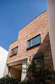 A Sculptural Wooden Staircase Steals the Show in This Mexico City Abode - Photo 7 of 9 -
