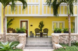 Forget Coworking—These Coliving Spaces Let You Travel the World For $1,800 a Month - Photo 1 of 25 - Roam Miami Yellow House