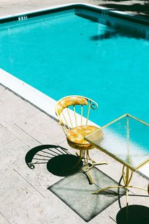 Forget Coworking—These Coliving Spaces Let You Travel the World For $1,800 a Month - Photo 3 of 25 - Roam Miami pool