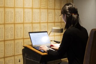 Forget Coworking—These Coliving Spaces Let You Travel the World For $1,800 a Month - Photo 23 of 25 - Roam Tokyo's individual work space features wallpaper created from pages of a textbook on butterflies, referencing to traditional Japanese Shoji style.