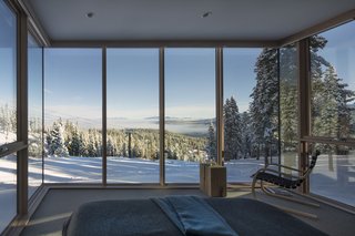 These Contemporary Lake Tahoe Chalets Have Ski-In, Ski-Out Access - Photo 8 of 11 - Surrounded by glazing on three sides, the master is a suite above the slopes, surrounded by nature. 