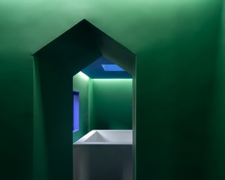 The triangular, masculine motif is carried through to the arched passageways.