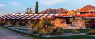 Constructed from local desert rocks, the exterior walls resonate with the natural setting.