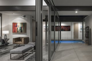Further emphasizing the indoor/outdoor connection is a water feature which extends between spaces.