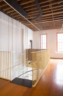 A Steel Staircase Merges Two Units Into One in Tribeca - Photo 13 of 13 - A sculptural composition of various metals supports and redefines the notion of a staircase. 