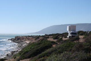 As the truck moves from spot to spot, it's sure to stop at the most scenic, ideal surfing locations. Windows on the second level provide ocean views for guests.
