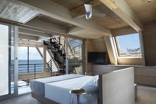 The master suite provides a dreamy place to relax with bay views.