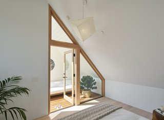 A quaint sun-deck becomes a hidden surprise off the master bedroom.