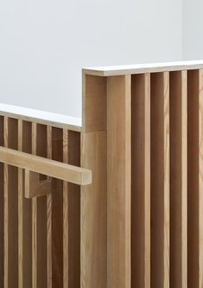 Simple, refined details transform this atrium space into a contemporary, architectural solution that blends nicely with the existing framework.