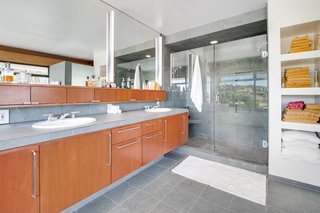 Not only does the master bath include a large soaking tub, it also features a gracious vanity and a walk-in tile shower.