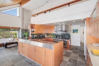 A unique loft space is located above the kitchen.
