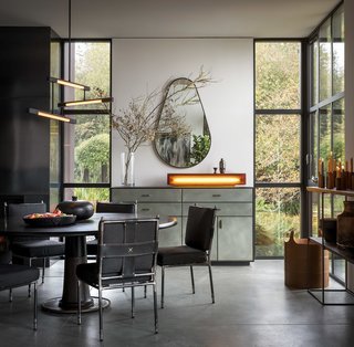 A Wintercheck Factory light sits atop a credenza by Wüd Furniture Design. 