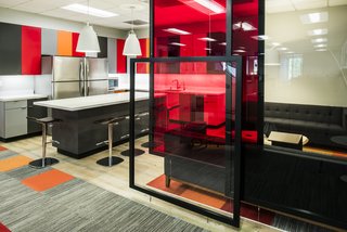 Custom-made panels provide some privacy and separation in the open space.