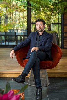 Owner Shane Pliska has fully embraced the home's modernist style and profound connection to nature.