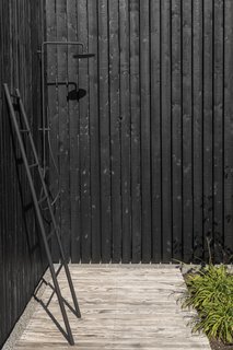 An open-air shower is the perfect wash station after outdoor recreation at the lake. 
