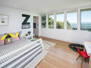 Each of the home's bedrooms is situated to enjoying the stunning mountain views.