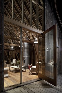 Located in the eastern foothills of the cascades, this renovation converted a turn of the century working barn into a three-bedroom retreat from the city. The building was restored with the intention of creating a comfortable home while retaining much of its original form, character, and history. Siding, paneling, flooring, even fixtures and doors were sourced from either the original building or salvage yards. 