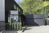 Modern home with Exterior, Flat RoofLine, House Building Type, and Wood Siding Material. Entry Photo 2 of Riverwood