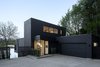 Modern home with Exterior, House Building Type, Wood Siding Material, and Flat RoofLine. Entry Photo of Riverwood