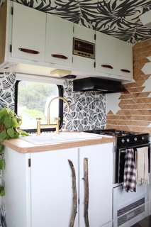 A Portland Couple Renovate a 1982 RV, Turning It Into Their New Home - Photo 11 of 12 - Kamarul scavenged for the driftwood handles that make a statement on the cabinets.