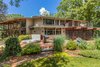 Modern home with Outdoor, Back Yard, Gardens, Trees, Grass, Decking Patio, Porch, Deck, Wood Patio, Porch, Deck, and Large Patio, Porch, Deck. Back Photo 3 of Beautifully Designed Contemporary